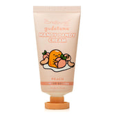The Crème Shop Hello Kitty crema de manos durazno, empaque portátil para hidratación suave en cualquier lugar.