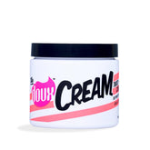 The Doux C.R.E.A.M. Twist & Curl Cream en bote, define rizos con hidratación.
