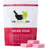 The Herbal Zen Head Hug shower steamer close-up releasing peppermint aroma.