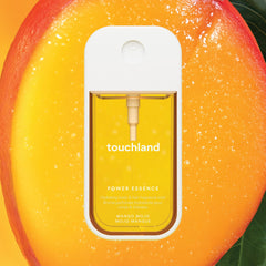 Touchland Mango Mojo capless travel size for on-the-go use