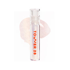 Tower 28 ShineOn Lip Jelly aplicación suave con brillo dorado sutil.