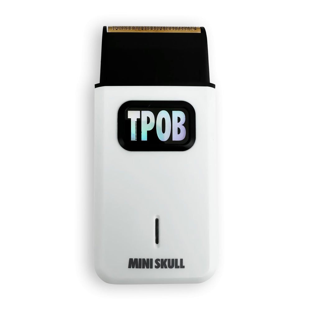 Afeitadora Mini Calavera de TPOB, diseño compacto para llevar, afeitado rápido y cómodo.