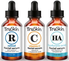 TruSkin Vitamina C serum, botella luminosa, ilumina el tono de la piel.