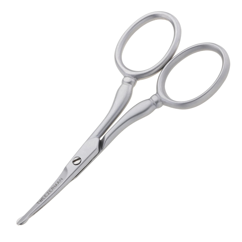 Tijeras Tweezerman G.E.A.R. para vello facial, diseño compacto para retoques precisos.
