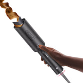 TYMO CURLPRO con recubrimiento cerámico-turmalina para ondas suaves y duraderas.