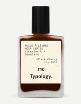 Typology Lip Oil, botella con color sutil y acabado brillante para labios.
