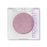 URBAN DECAY Moondust sombra glitter lila con efecto mojado y brillo intenso.