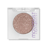 Sombra URBAN DECAY Moondust Space Cowboy con brillo intenso y wet look.