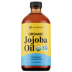 Us Naturals Aceite de jojoba orgánico en botella de vidrio oscura para brillo natural