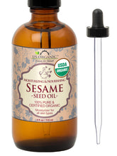 US Organic Aceite de sésamo sin tostar en botella ámbar con gotero, ideal para masaje suave.
