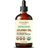 Botella de vidrio ámbar Velvoria Naturals con aceite de jojoba puro para piel y cabello