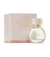 Victoria's Secret Bare Magnolia botella elegante para aroma floral cremoso y duradero.