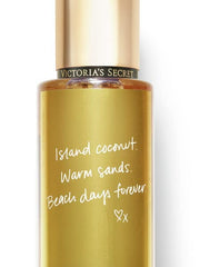 Victoria's Secret Coconut Passion Mist spray in action for beachy mood and lasting fragrance.
