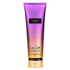 Victoria's Secret Love Spell loción fragancia cerezo y durazno para hidratación suave.