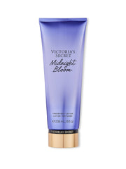 Victoria's Secret Midnight Bloom loción corporal en botella, hidratación duradera para la piel.