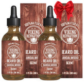 Aceite para barba Viking Revolution en botella, aroma de sándalo duradero.