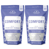 Village Naturals Therapy Comfort Bath, espuma abundante en primer plano para relajación muscular.