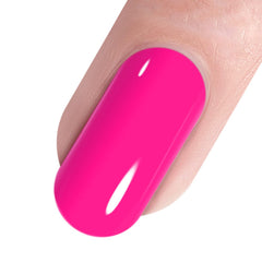 Aplicación en uñas con gel rosa caliente para cobertura completa.