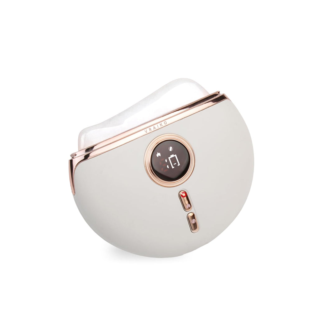 La Aurora de VRAIKO Gua Sha de jade blanco para un rejuvenecimiento suave en casa.