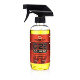 Walker Tape C-22 spray bottle closeup showing fast-drying adhesive remover for scalp applications