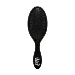 Wet Brush Original Detangler negro, pelo húmedo, desenredo suave sin tirones.