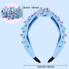 Diadema WILLBOND con perlas y nudo cruzado azul, ideal para looks primaverales.