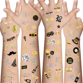 Tatuajes XZENTIRA con fuegos artificiales en negro y dorado para fiesta.