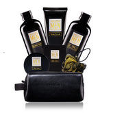 Coffret Yard House pour homme avec trousse de toilette en cuir et parfum santal-ambre.
