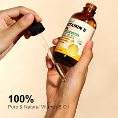 Yoken aceite vitamina E de color dorado con textura suave para masajes.