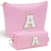 Estuche de maquillaje inicial YOOLIFE en rosa, práctico para viajes y uso diario.