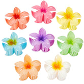 Clips flor hawaiana de YosaiHom en rosa con agarre estable para el cabello.