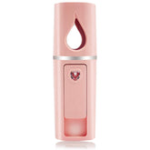 YUNYILAN nano-mister facial portátil con tanque visual de 20 ml para hidratación diaria.
