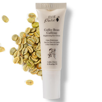 100% PURE Crema de ojos con cafeína, envase compacto para viaje.