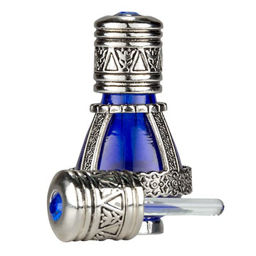 3 ARCHES USA: frasco azul cobalto con aceite de unción spikenard para rituales.