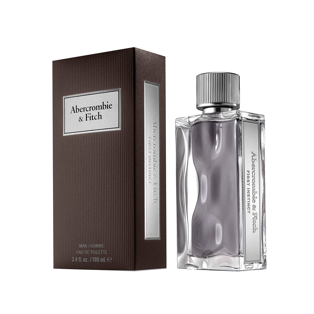 Abercrombie & Fitch First Instinct, etiqueta plateada visible, diseño elegante para salidas.