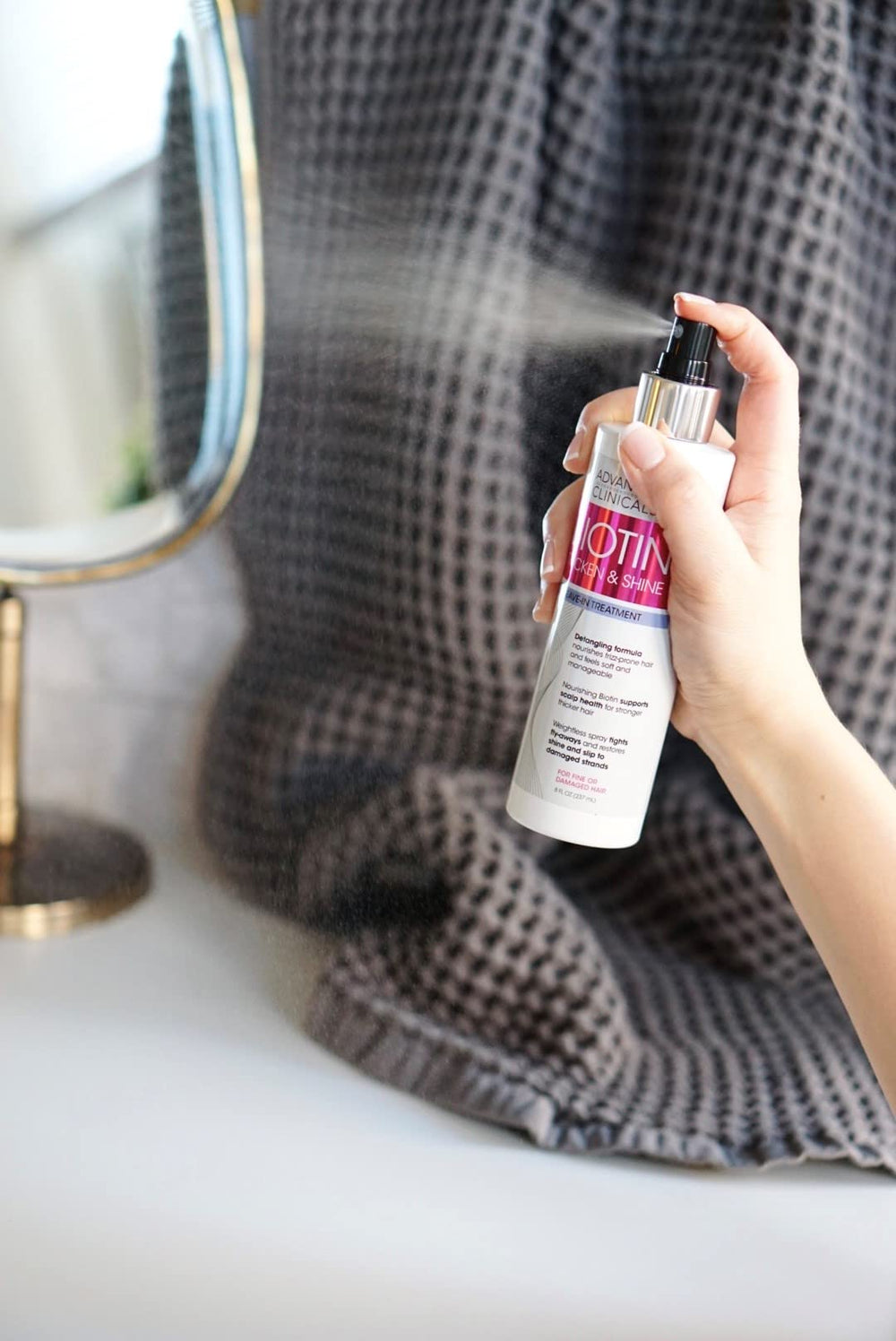 Advanced Clinicals Hair Spray bottle and mist capture color-treated hydration impact.