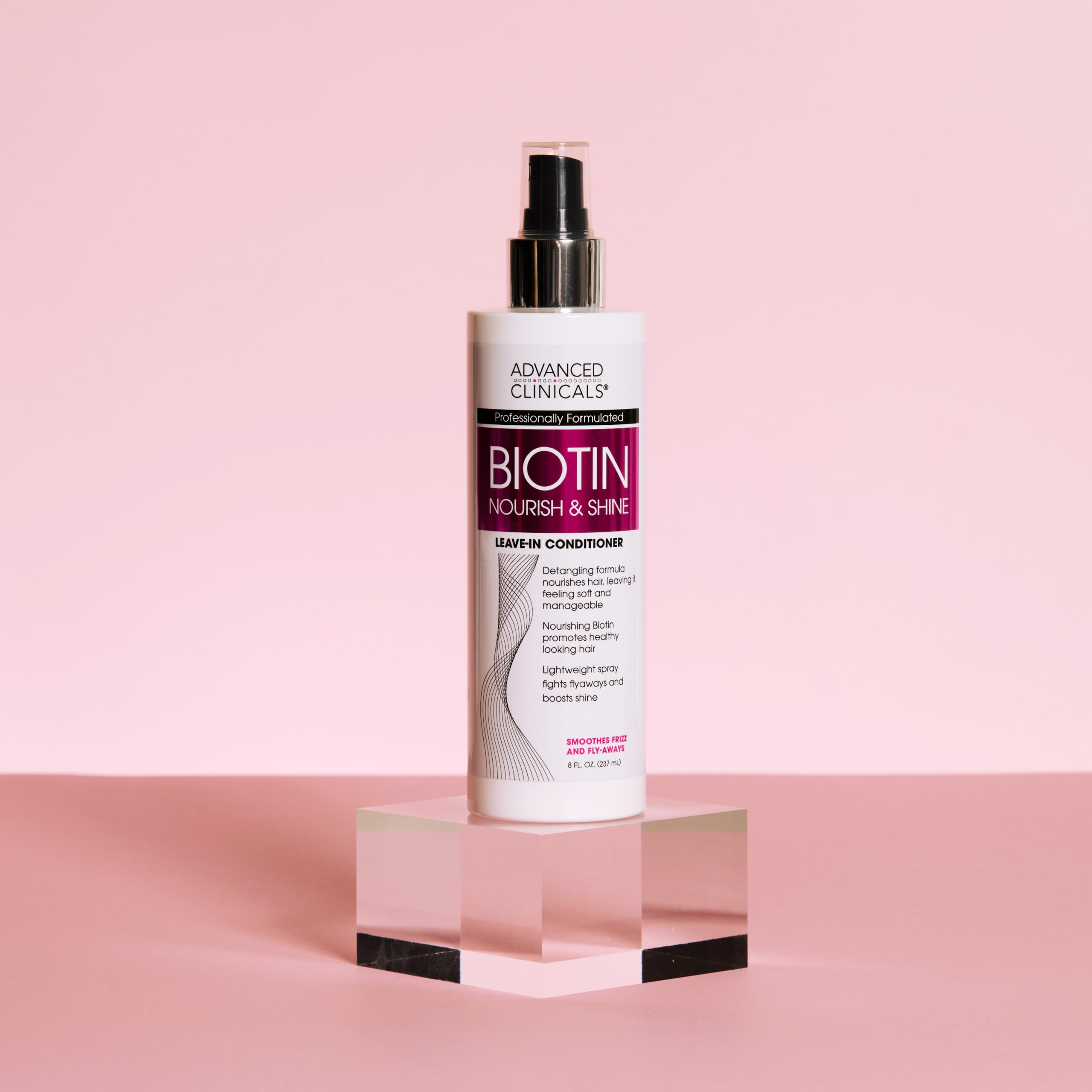 Advanced Clinicals Hair Spray on model shows smooth, glossy hair after styling.