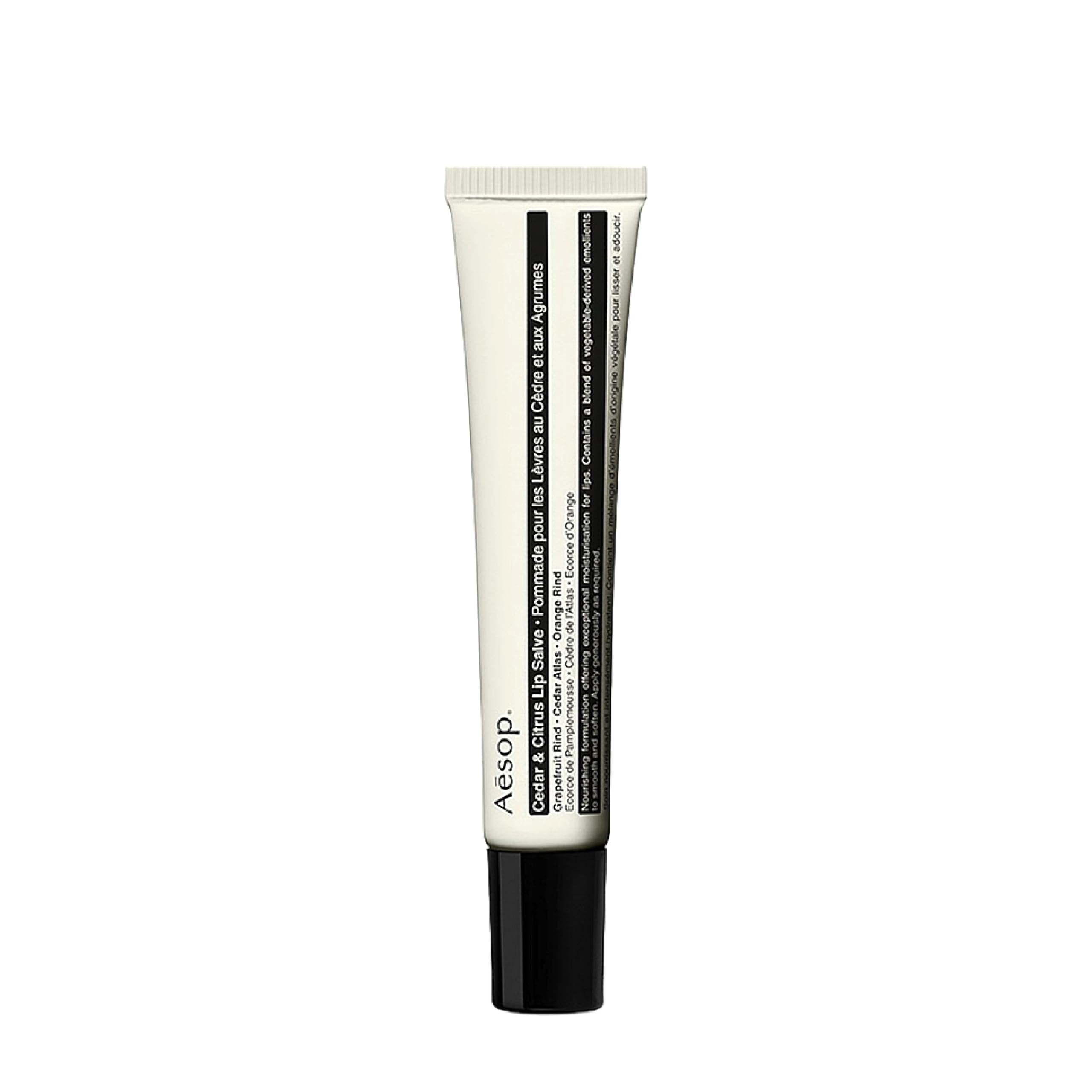 Balsamo labial Aesop con cedro y citricos en envase práctico para viajes