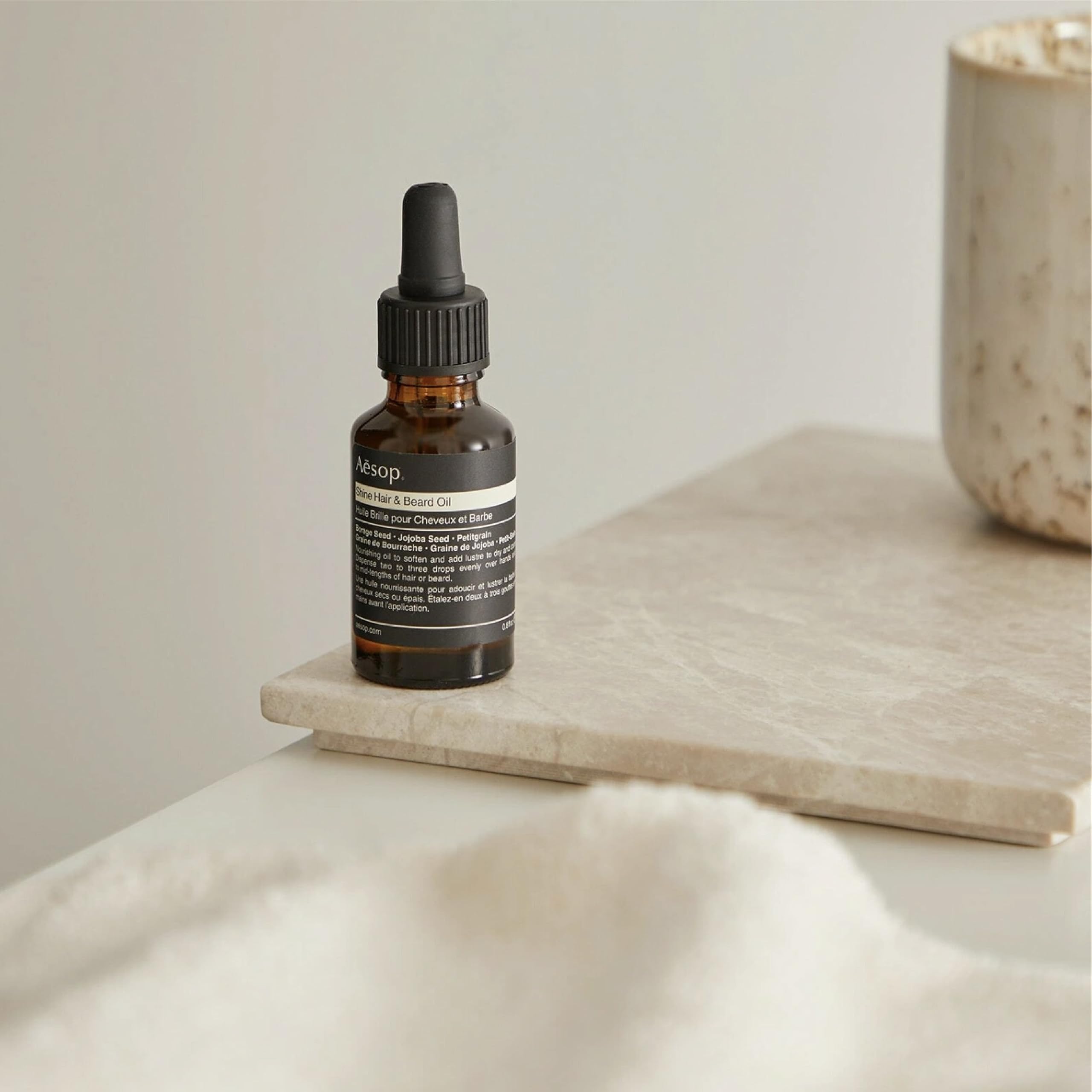 Aesop Shine, ideal para cabello grueso y seco, reducción de encrespamiento.