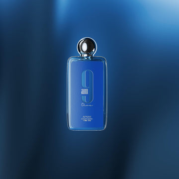Afnan 9 AM Dive, botella en uso nocturno, transición suave entre día y noche.