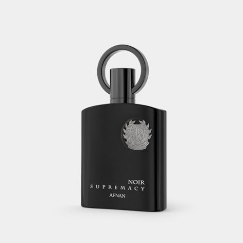 Afnan Supremacy Noir: etiqueta detalle con acabado premium y diseño distintivo.