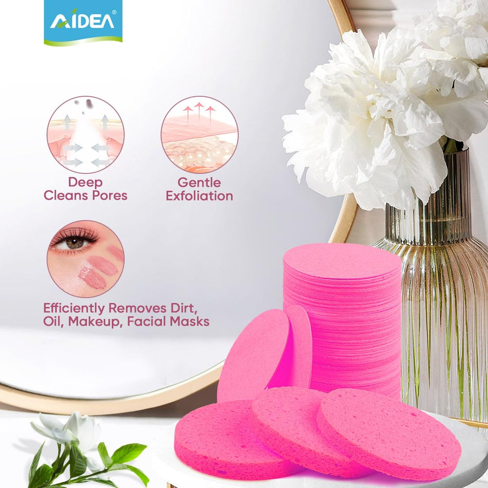Éponge AIDEA visage compressée rose, texture douce pour le soin quotidien.
