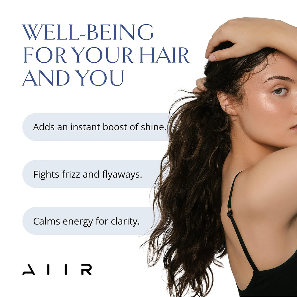 AIIR Shine Spray protege contra calor para un peinado suave.