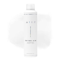 AIIR Spray de Textura, botella, aporta volumen ligero y textura natural.