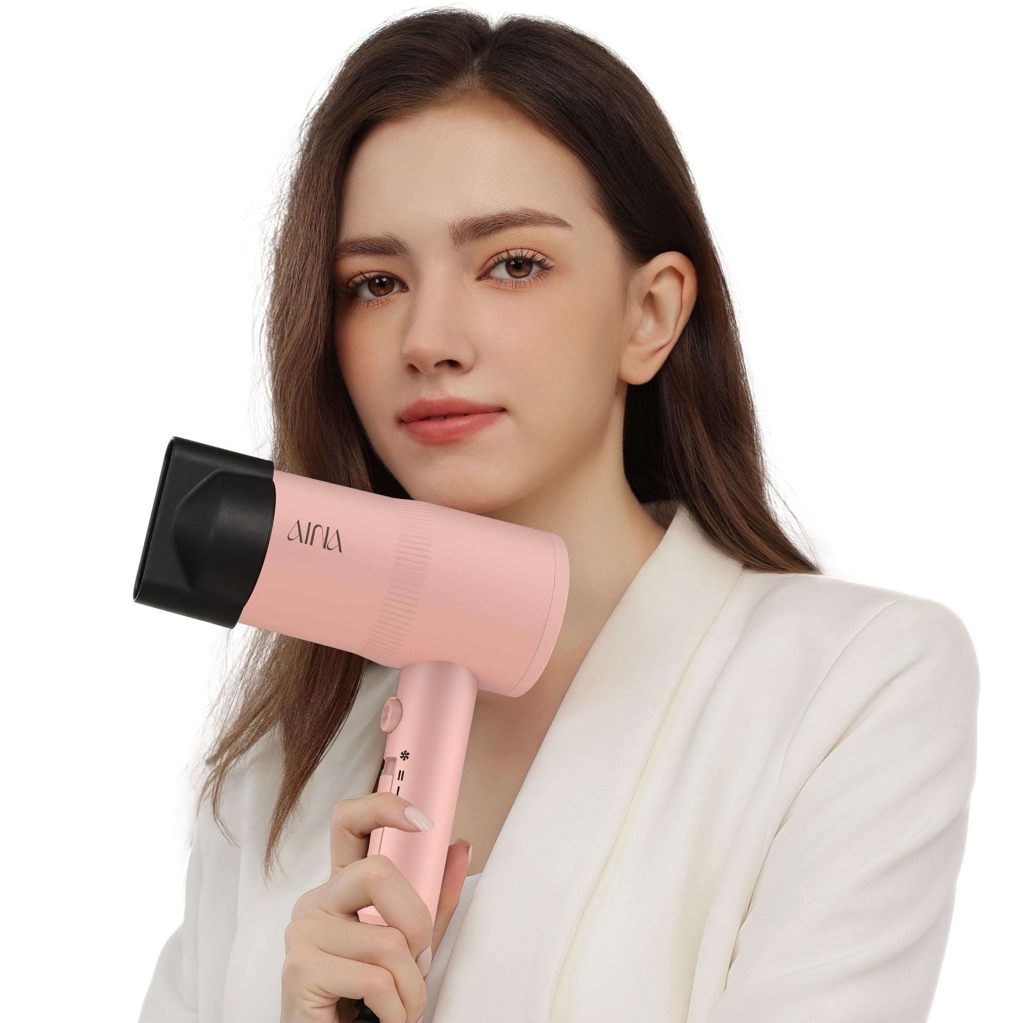 Aina secador en tono rosa para uso diario en casa o de viaje.