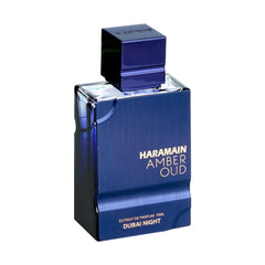 Al Haramain Amber Oud Dubai Night, atomizador visible, aroma intenso para momentos especiales.