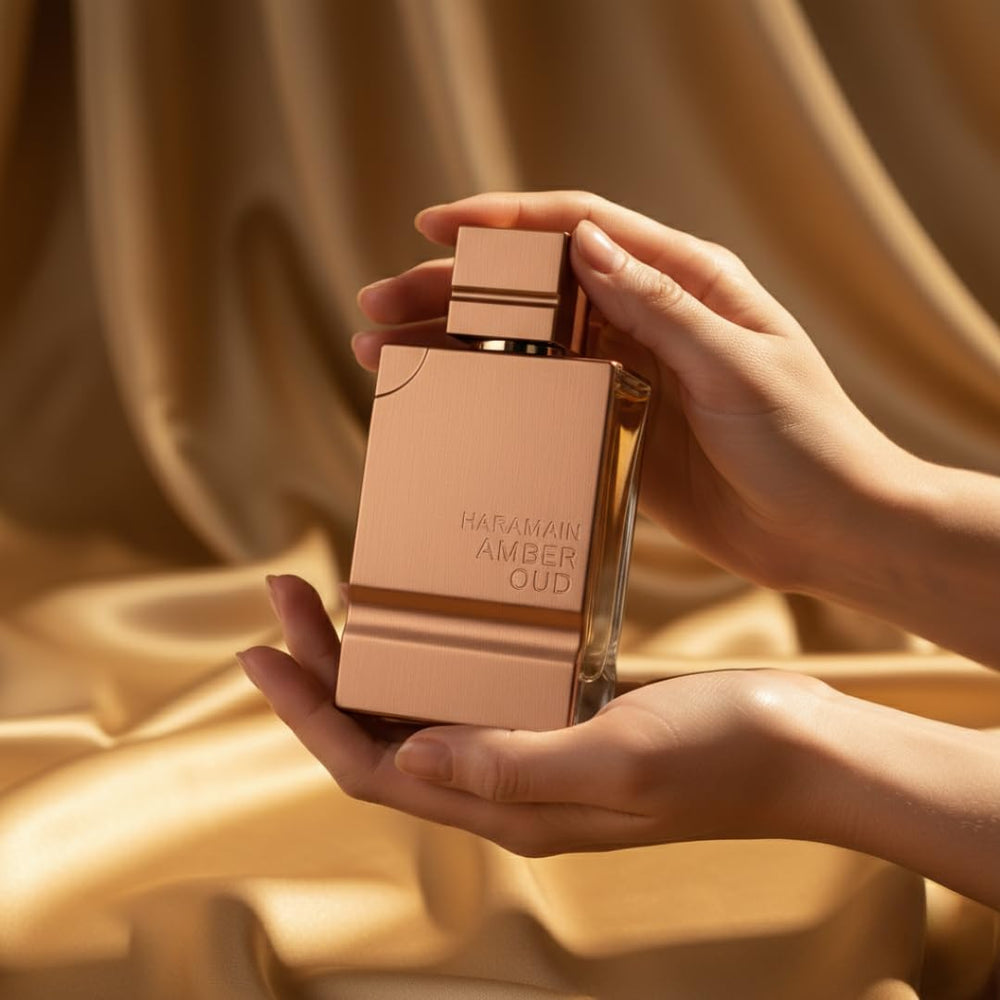 Al Haramain Amber Oud Gold Edition tapa visible con cierre seguro para viaje.