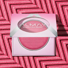 Almay Blush muestra muestra en mejilla rosa para color suave.