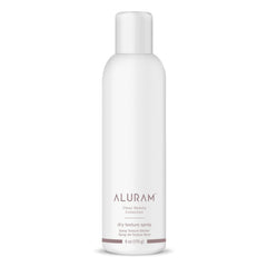 ALURAM Brume texturante sèche, bouteille montrant volume naturel et texture.