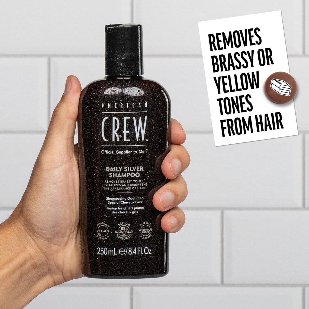 Botella de American Crew con fórmula vegana para cabello masculino.